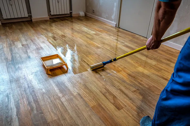 Worker laying poly